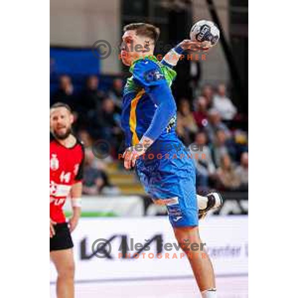 Oleksander Unufriienko of RK Celje Pivovarna Lasko in action during 1.NLB handball match between LL Grosist Slovan and RK Celje PL in Kodeljevo Hall, Ljubljana, Slovenia on December 13th, 2025.