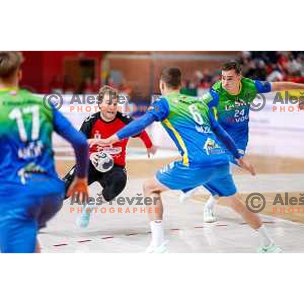 Lovro Viscek of RD LL Grosist Slovan in action during 1.NLB handball match between LL Grosist Slovan and RK Celje PL in Kodeljevo Hall, Ljubljana, Slovenia on December 13th, 2025.