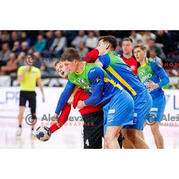 Lovro Viscek of RD LL Grosist Slovan in action during 1.NLB handball match between LL Grosist Slovan and RK Celje PL in Kodeljevo Hall, Ljubljana, Slovenia on December 13th, 2025.