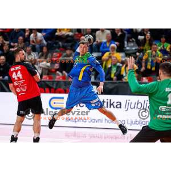 Oleksander Unufriienko of RK Celje Pivovarna Lasko in action during 1.NLB handball match between LL Grosist Slovan and RK Celje PL in Kodeljevo Hall, Ljubljana, Slovenia on December 13th, 2025.