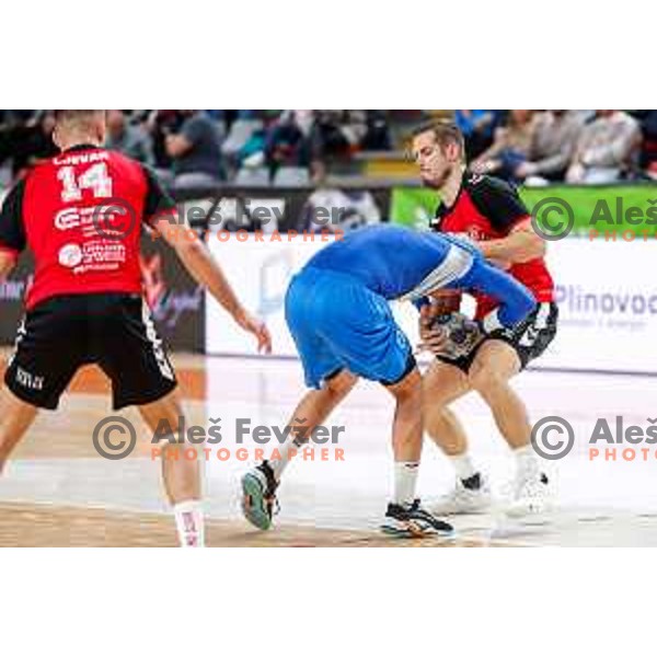Oleksander Unufriienko of RK Celje Pivovarna Laskoin action during 1.NLB handball match between LL Grosist Slovan and RK Celje PL in Kodeljevo Hall, Ljubljana, Slovenia on December 13th, 2025.