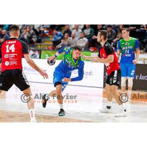 Oleksander Unufriienko of RK Celje Pivovarna Lasko in action during 1.NLB handball match between LL Grosist Slovan and RK Celje PL in Kodeljevo Hall, Ljubljana, Slovenia on December 13th, 2025.
