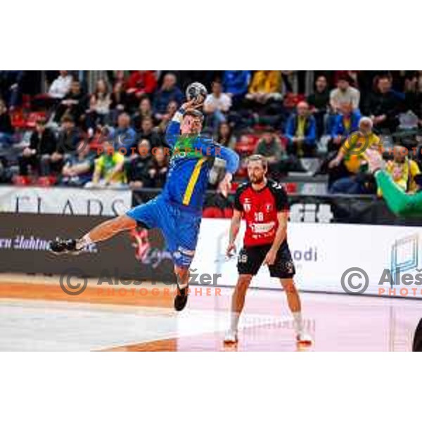Oleksander Unufriienko of RK Celje Pivovarna Lasko in action during 1.NLB handball match between LL Grosist Slovan and RK Celje PL in Kodeljevo Hall, Ljubljana, Slovenia on December 13th, 2025.