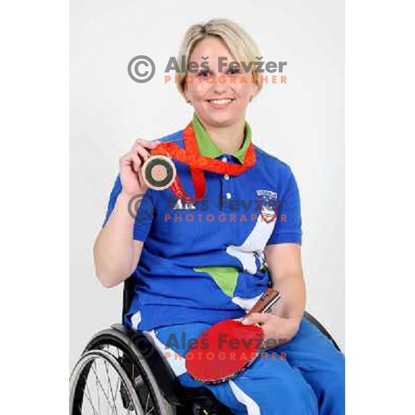 Mateja Pintar,member of Slovenia Paraolympic team showing medal from Paraolympic Games in Beijing, China, september 2008. 