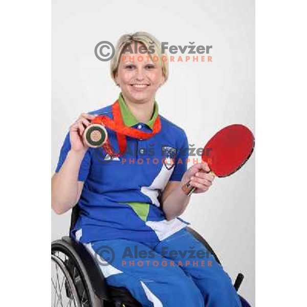 Mateja Pintar,member of Slovenia Paraolympic team showing medal from Paraolympic Games in Beijing, China, september 2008. 