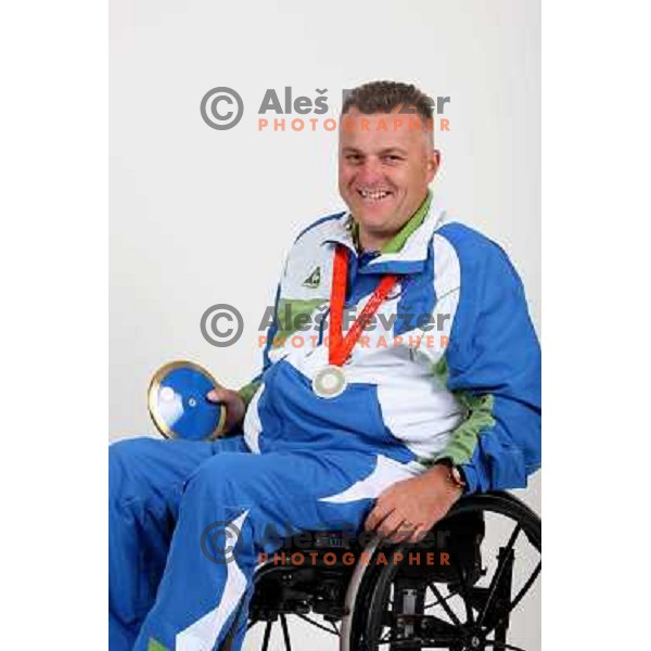Joze Flere,member of Slovenia Paraolympic team showing medal from Paraolympic Games in Beijing, China, september 2008. 