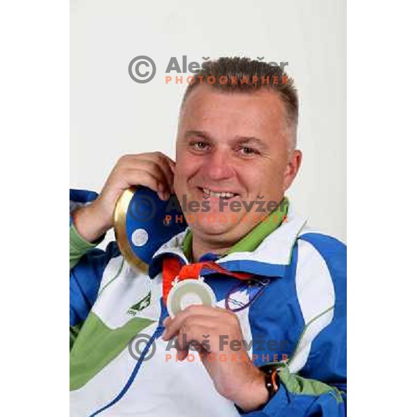 Joze Flere,member of Slovenia Paraolympic team showing medal from Paraolympic Games in Beijing, China, september 2008. 