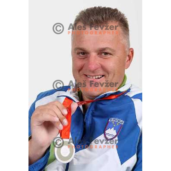 Joze Flere,member of Slovenia Paraolympic team showing medal from Paraolympic Games in Beijing, China, september 2008. 