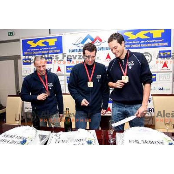 Emil Tahirovic (left), Peter Mankoc, Matjaz Markic (right) with medals from European Swimming Championship in 25 meters pool at press conference in Hala Tivoli, Ljubljana 15.12.2008 