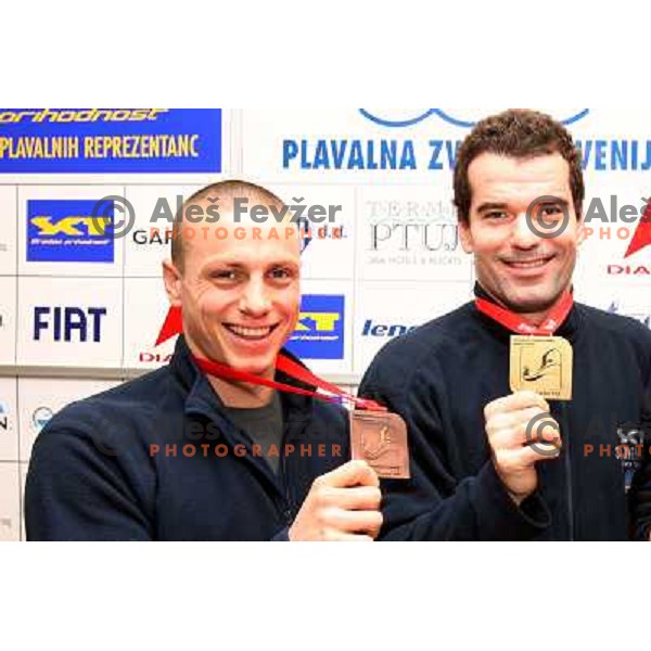 Emil Tahirovic (left) and Peter Mankoc with medals from European Swimming Championship in 25 meters pool at press conference in Hala Tivoli, Ljubljana 15.12.2008 