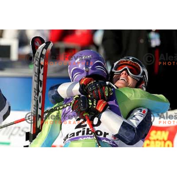 Denise Carbon congratulates Tina Maze after her victory at 45.Golden fox- Zlata Lisica Audi FIS World Alpine skiing giant slalom in Maribor, Slovenia 10.1.2009 
