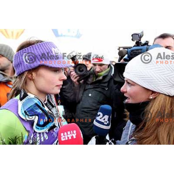 Tina Maze talks to Spela Pretnar after victory at 45.Golden fox- Zlata Lisica Audi FIS World Alpine skiing giant slalom in Maribor, Slovenia 10.1.2009 