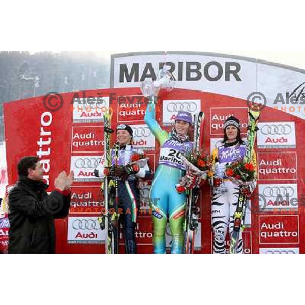 Borut Pahor, Second placed Denise Karbon (ITA,left) ,winner Tina Maze (SLO) and third placed Kathrin Hoelzl (GER) at victory podium oft 45.Golden fox- Zlata Lisica Audi FIS World Alpine skiing giant slalom in Maribor, Slovenia 10.1.2009 