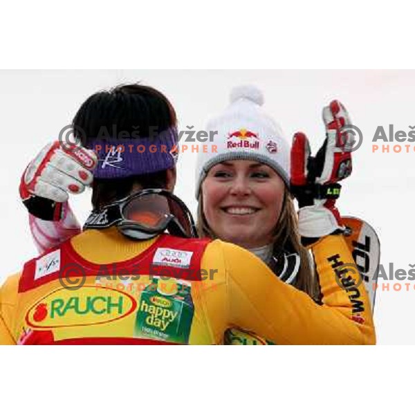 winner Maria Riesch (GER) and fourth placed Lindsay Vonn (USA,right) at podium of Audi FIS Ski world Cup slalom at 45.Golden fox- Zlata Lisica , Maribor, Slovenia 11.1.2009 