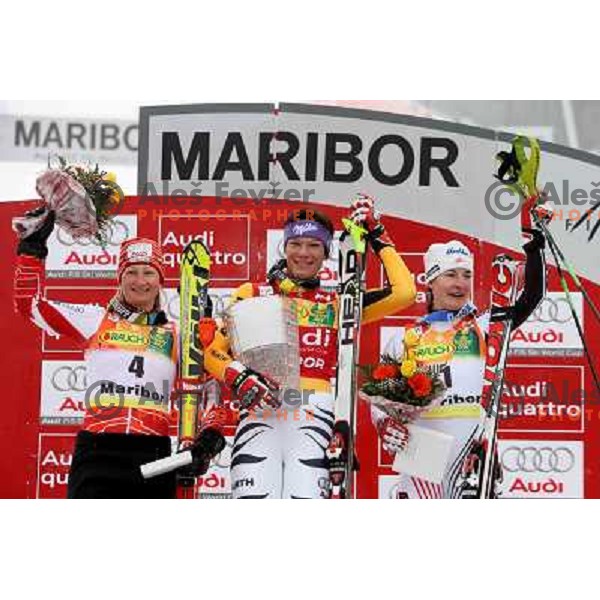 third placed Tanja Poutiainen (FIN), winner Maria Riesch (GER) and second placed Kathrin Zettel (AUT) at podium of Audi FIS Ski world Cup slalom at 45.Golden fox- Zlata Lisica , Maribor, Slovenia 11.1.2009 