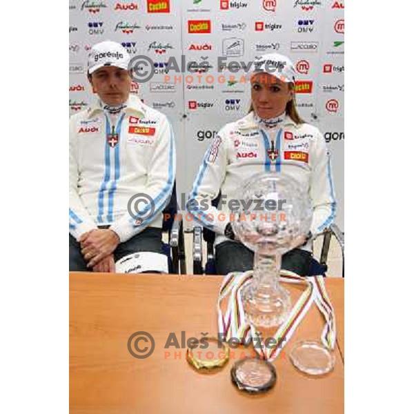 Ivan Hudac and Petra Majdic with World cup medals and trophy at post- season press conference in Ljubljana 24.3.2009 