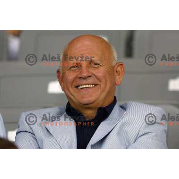 Janez Kocijancic watching Jolanda Ceplak (SLO) winning bronze medal at 800 meters at Olympic games Athens 2004 