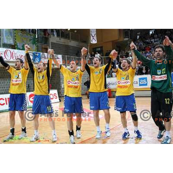 Stanic (12) and RK Cimos Koper players celebrate at handball match Rk Cimos Koper- RK Celje Pivovarna Lasko in Final of Slovenian Cup, played in Bonifika Hall in Koper 19.4.2009. RK Cimos Koper won 24:19 and won the Cup 