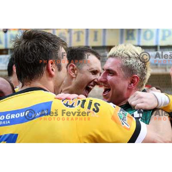 Voncina (1) and RK Cimos Koper players celebrate at handball match Rk Cimos Koper- RK Celje Pivovarna Lasko in Final of Slovenian Cup, played in Bonifika Hall in Koper 19.4.2009. RK Cimos Koper won 24:19 and won the Cup 
