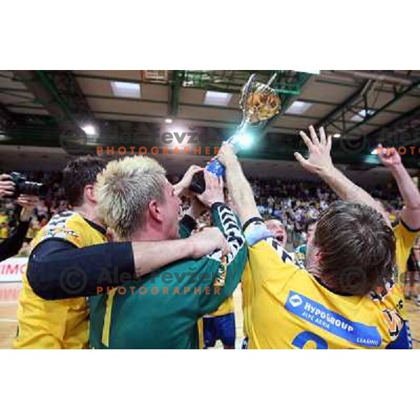Voncina (1) and RK Cimos Koper players celebrate at handball match Rk Cimos Koper- RK Celje Pivovarna Lasko in Final of Slovenian Cup, played in Bonifika Hall in Koper 19.4.2009. RK Cimos Koper won 24:19 and won the Cup 