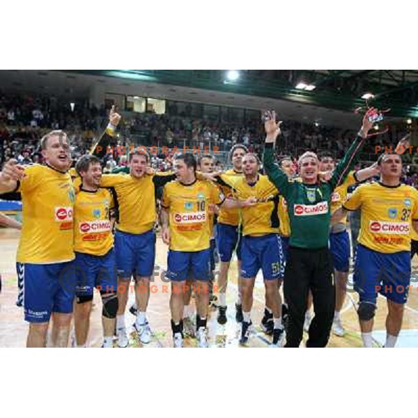 Voncina (1) and RK Cimos Koper players celebrate at handball match Rk Cimos Koper- RK Celje Pivovarna Lasko in Final of Slovenian Cup, played in Bonifika Hall in Koper 19.4.2009. RK Cimos Koper won 24:19 and won the Cup 