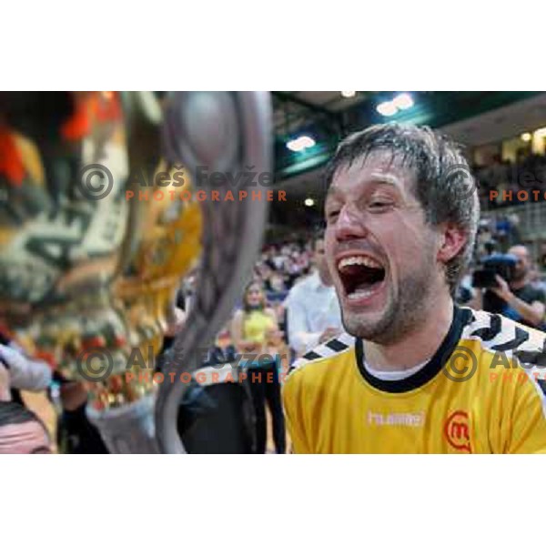 Uros Rapotec and RK Cimos Koper players celebrate at handball match Rk Cimos Koper- RK Celje Pivovarna Lasko in Final of Slovenian Cup, played in Bonifika Hall in Koper 19.4.2009. RK Cimos Koper won 24:19 and won the Cup 