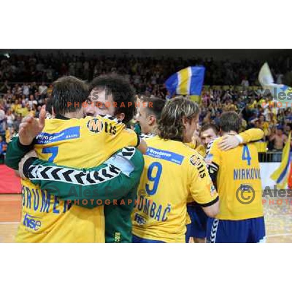 Stanic (12) and RK Cimos Koper players celebrate at handball match Rk Cimos Koper- RK Celje Pivovarna Lasko in Final of Slovenian Cup, played in Bonifika Hall in Koper 19.4.2009. RK Cimos Koper won 24:19 and won the Cup 