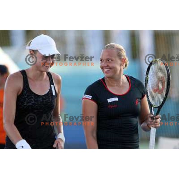 Elena Bovina (RUS) and Kaia Kanepi (EST) in action during match in first round of Banka Koper Slovenia Open WTA tour tennis tournament in Portoroz, Slovenia 20.7.2009 