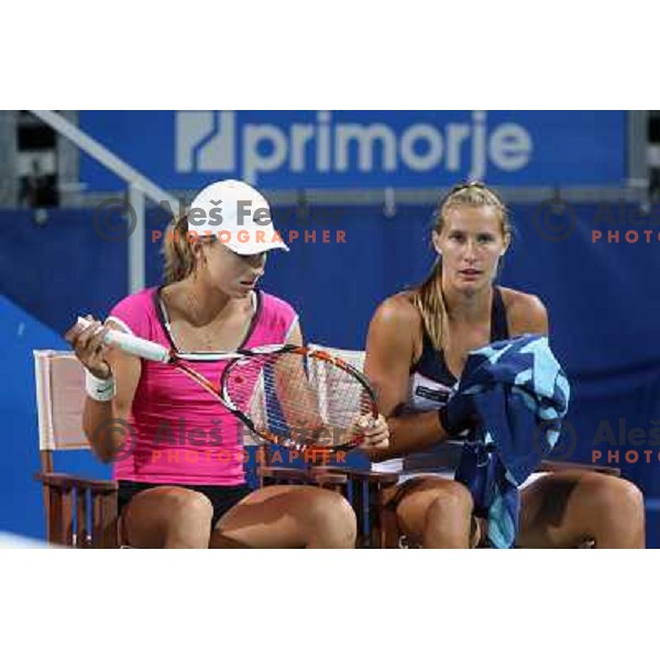 Petra Martic (CRO) and Polona Hercog (SLO) in action during match in first round of Banka Koper Slovenia Open WTA tour tennis tournament in Portoroz, Slovenia 20.7.2009 