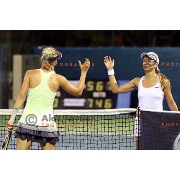Viktoriya Kutuzova (UKR) and Rossana De Los Rios (PAR) in action during match in first round of Banka Koper Slovenia Open WTA tour tennis tournament in Portoroz, Slovenia 20.7.2009 