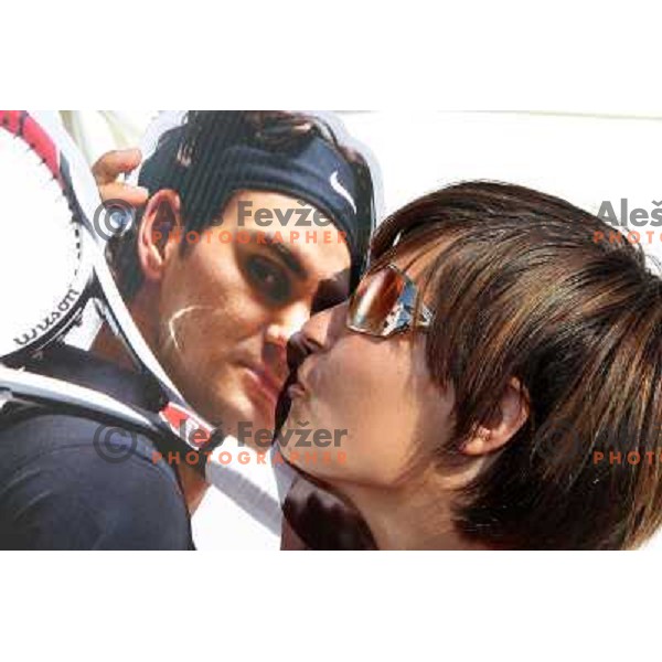 Federer gets a kiss from Wilson tent staff during first round of Banka Koper Slovenia Open, WTA tour, Portoroz 21.7.2009 