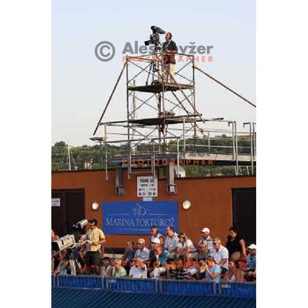 Cameraman in action in second round of Banka Koper Slovenia Open, WTA tour, Portoroz, Slovenia 22.7.2009 