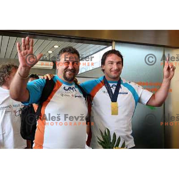 Coach Vladimir Kevo and Primoz Kozmus, gold medalist in hammer throw from Athletics World Championships in Berlin during reception at Airport Joze Pucnik, Brnik, Slovenia 19.8.2009 