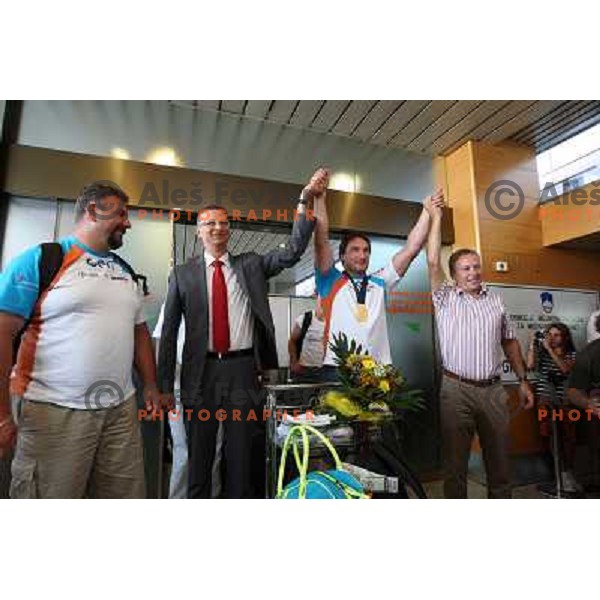 Kevo, Luksic, Primoz Kozmus, gold medalist in hammer throw from Athletics World Championships in Berlin and Kukovica during reception at Airport Joze Pucnik, Brnik, Slovenia 19.8.2009 