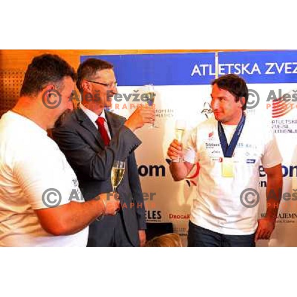 Vladimir Kevo, Igor Luksic and Primoz Kozmus. gold medalist in hammer throw from Athletics World Championships in Berlin during reception at Airport Joze Pucnik, Brnik, Slovenia 19.8.2009 