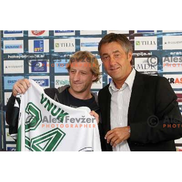 Tomaz Vnuk , ice- hockey player of Tilia Olimpija announced his retirement from active playing and Mitja Mejac at press conference in Hala Tivoli, Ljubljana, Slovenia 5.10.2009 