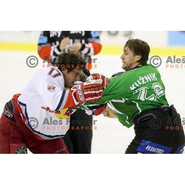 Michael Gergen (17) and Greg Kuznik (22) in fight action during ice-hockey match Tilia Olimpija-Red Bull Salzburg in Ebel league, played in Hala Tivoli, Ljubljana, Slovenia 1.10.2009 