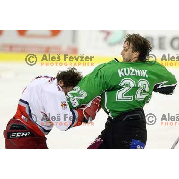 Michael Gergen (17) and Greg Kuznik (22) in fight action during ice-hockey match Tilia Olimpija-Red Bull Salzburg in Ebel league, played in Hala Tivoli, Ljubljana, Slovenia 1.10.2009 