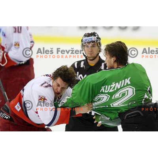 Michael Gergen (17) and Greg Kuznik (22) in fight action during ice-hockey match Tilia Olimpija-Red Bull Salzburg in Ebel league, played in Hala Tivoli, Ljubljana, Slovenia 1.10.2009 