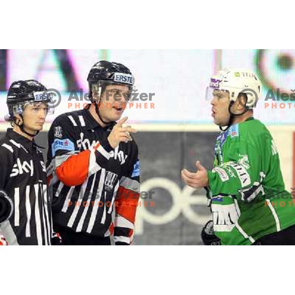 Referee Ladislav Smetana and Kevin Mitchell in action during ice-hockey match Tilia Olimpija-Red Bull Salzburg in Ebel league, played in Hala Tivoli, Ljubljana, Slovenia 1.10.2009 