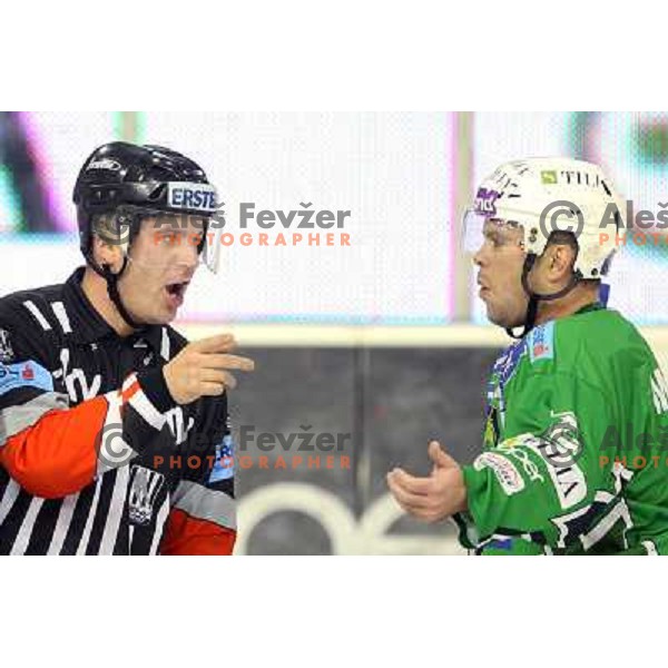 Referee Ladislav Smetana and Kevin Mitchell in action during ice-hockey match Tilia Olimpija-Red Bull Salzburg in Ebel league, played in Hala Tivoli, Ljubljana, Slovenia 1.10.2009 