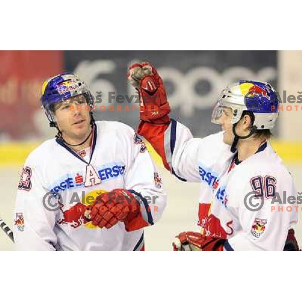 Siklenka and Ulmer celebrate goal during ice-hockey match Tilia Olimpija-Red Bull Salzburg in Ebel league, played in Hala Tivoli, Ljubljana, Slovenia 1.10.2009 