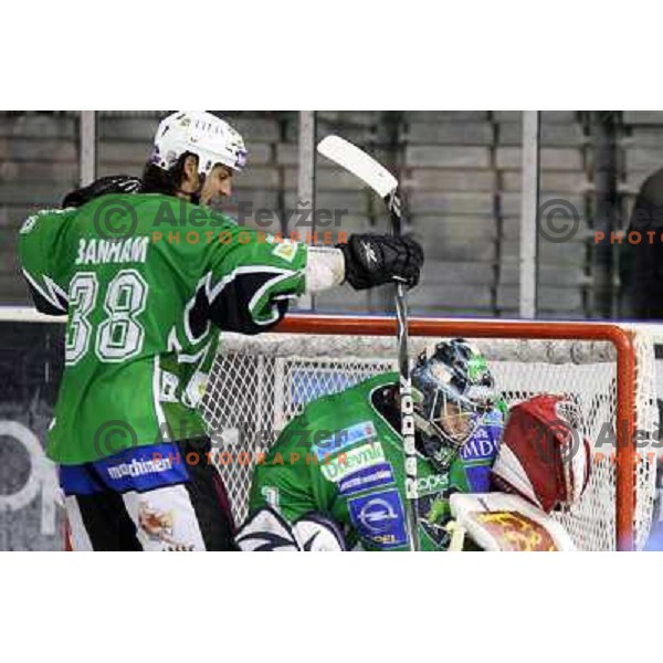 Frank Banham and Ales Sila in action during ice-hockey match Tilia Olimpija-Red Bull Salzburg in Ebel league, played in Hala Tivoli, Ljubljana, Slovenia 1.10.2009 