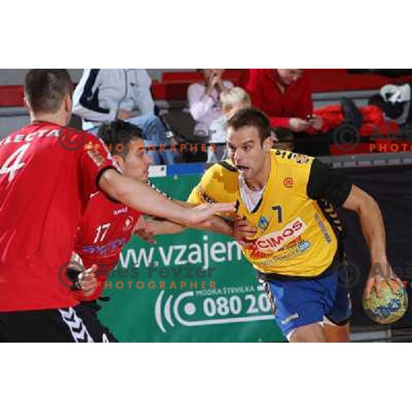Matjaz Brumen , Peter Hrvatin (17) in action during handball match RD Slovan- RK Cimos Koper in Mik 1.Liga, played at Kodeljevo, Ljubljana, Slovenia 6.11.2009 