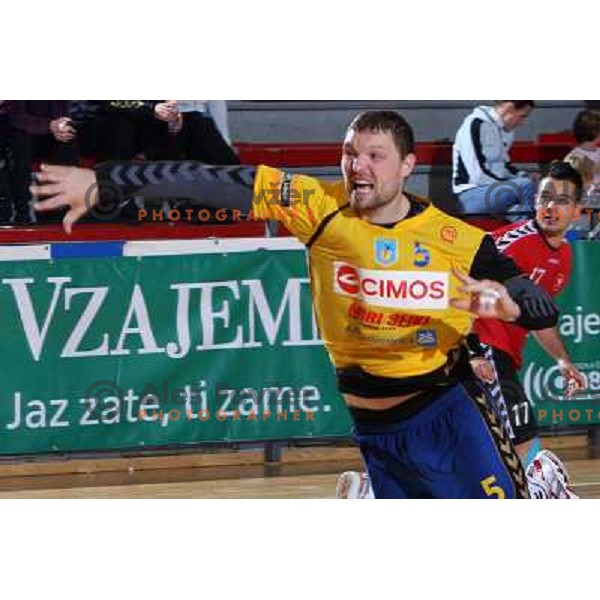 Rok Praznik in action during handball match RD Slovan- RK Cimos Koper in Mik 1.Liga, played at Kodeljevo, Ljubljana, Slovenia 6.11.2009 