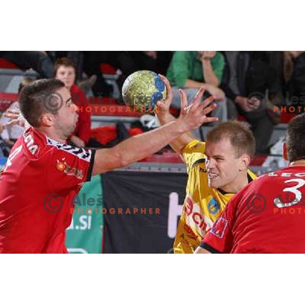David Kovac and Nejc Poklar in action during handball match RD Slovan- RK Cimos Koper in Mik 1.Liga, played at Kodeljevo, Ljubljana, Slovenia 6.11.2009 