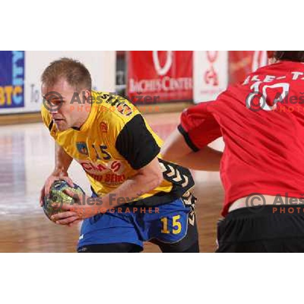 Nejc Poklar in action during handball match RD Slovan- RK Cimos Koper in Mik 1.Liga, played at Kodeljevo, Ljubljana, Slovenia 6.11.2009 