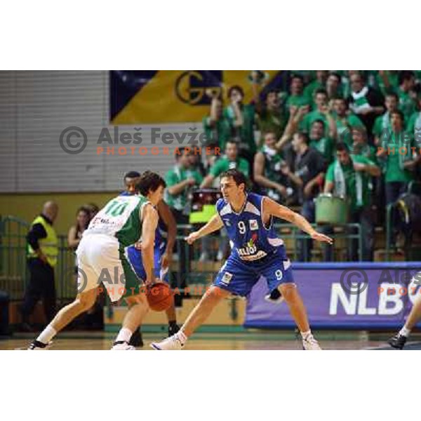 Uros Lucic, Mario Dundovic in action during basketball match Krka- Helios Domzale in round 6 of Telemach league, played in Novo Mesto, Slovenia 11.11.2009 