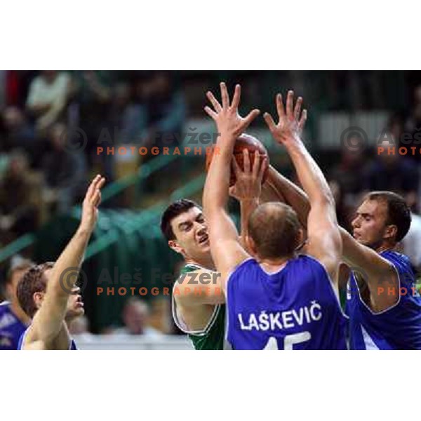 Milos Markovic and Aleksej Lashkevich, Miha Zalokar in action during basketball match Krka- Helios Domzale in round 6 of Telemach league, played in Novo Mesto, Slovenia 11.11.2009 