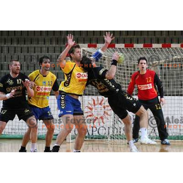Laluska and Harmandic in action during handball match Cimos Koper- Gorenje in MIK 1.liga, played in Bonifika Hall, koper, Slovenia 15.11.2009 